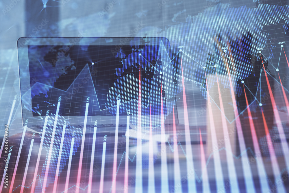 Forex market chart hologram and personal computer background. Multi exposure. Concept of investment. Forex market chart hologram and personal computer background. Multi exposure. Concept of investment.