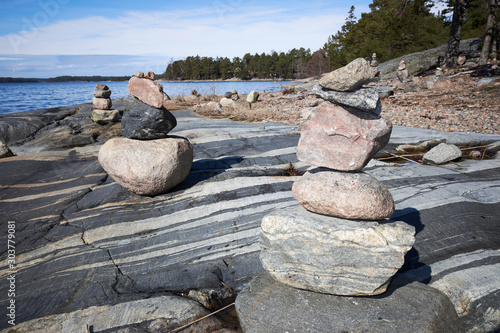 Peaceful summer landscape by the Baltic Sea in Kasnas, Kemio, Finland. Wide angle shot of the rocks on the seashore in the Finnish archipelago. photo