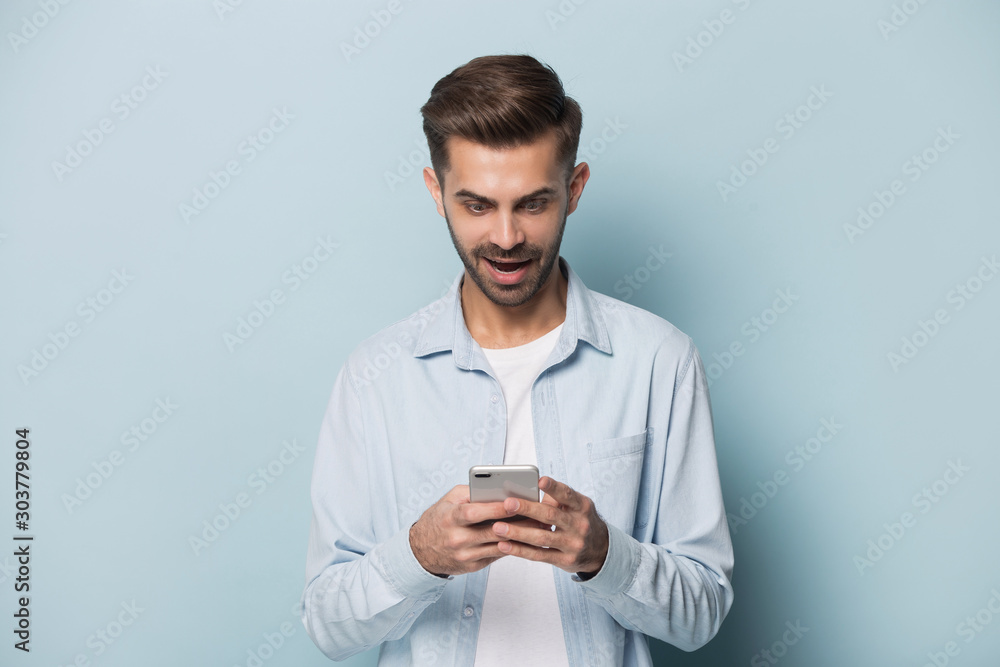 Close up portrait with handsome young man with mobile phone. Close up portrait with handsome young man with mobile phone.