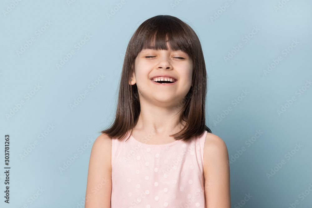 Close up portrait with laughing little brown-haired girl. Close up portrait with laughing little brown-haired girl.
