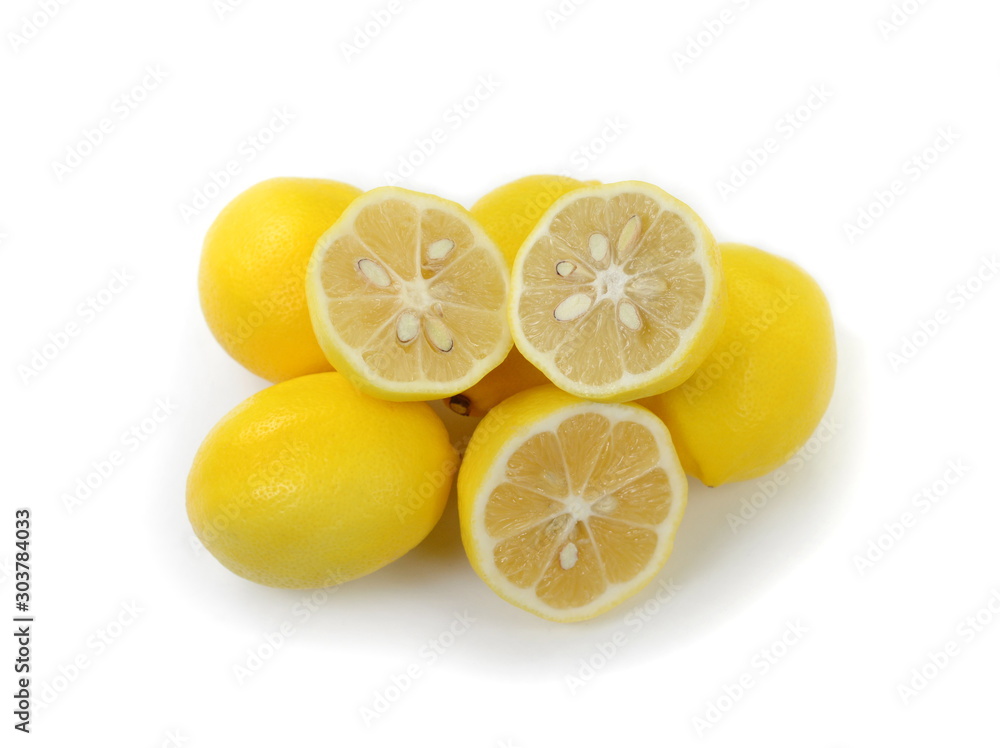 Heap of lemon. Juicy yellow slice of lemon on a white background isolated. Cut lemon fruits isolated on white background. Heap of lemon. Juicy yellow slice of lemon on a white background isolated. Cut lemon fruits isolated on white background.