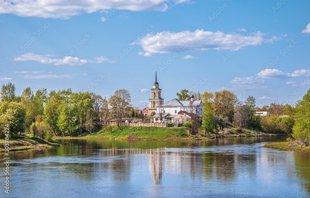 Old Orthodox village church on  river bank