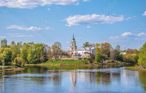 Old Orthodox village church on river bank