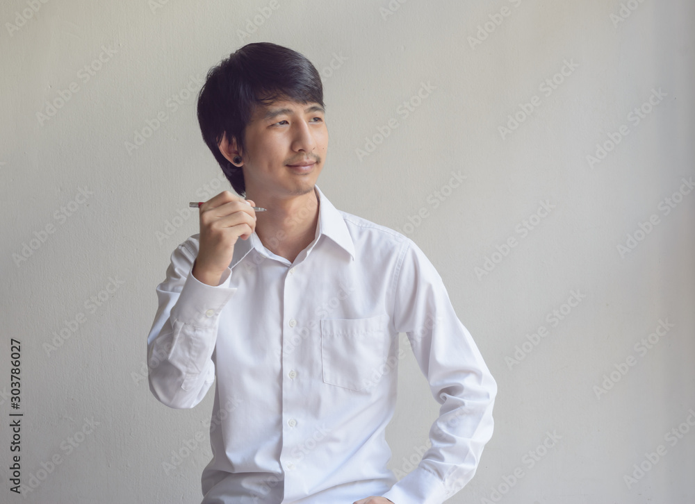 man holding pen man holding pen