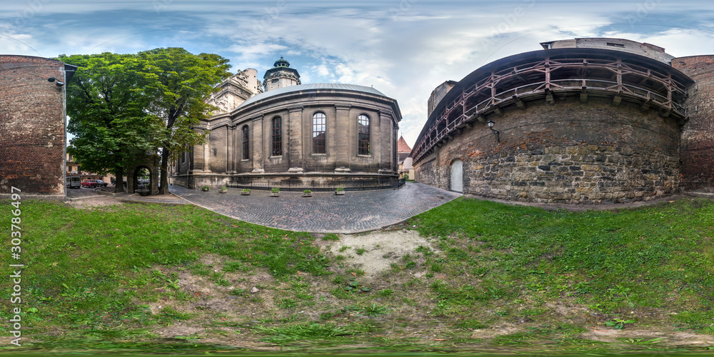 Full spherical seamless hdri panorama 360 degrees in the yard near fortress wall  uniate church in equirectangular projection with zenith and nadir, VR content