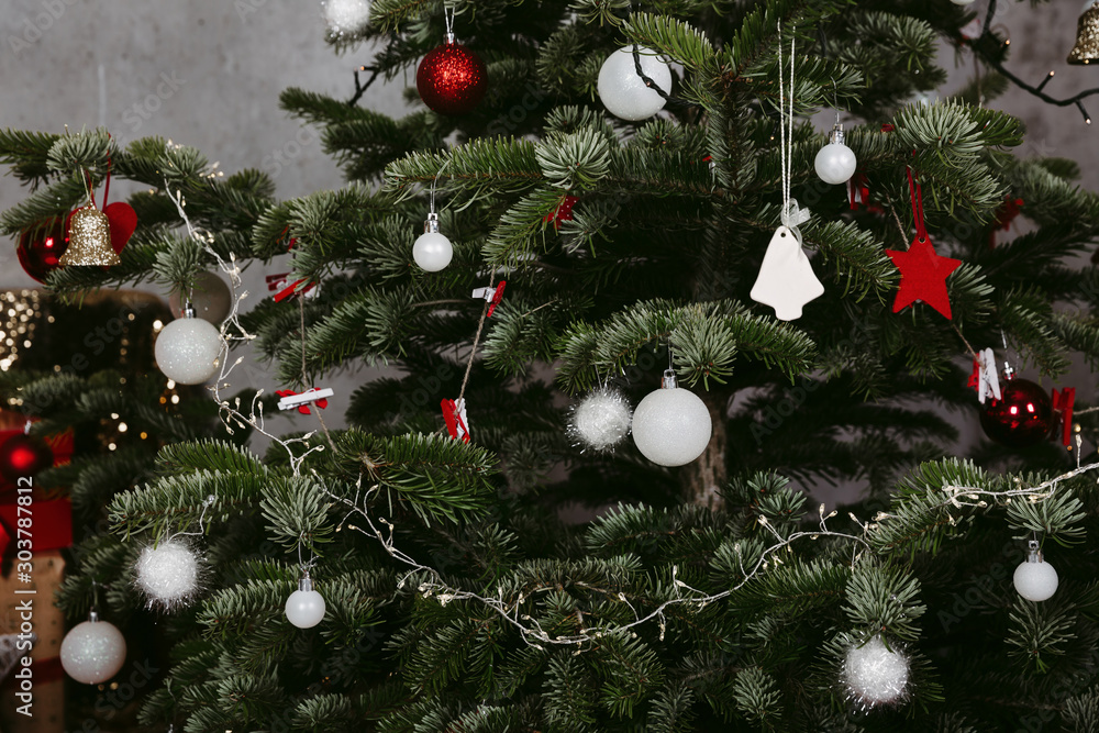 Fotografie Christmas tree with different ornaments and lights
