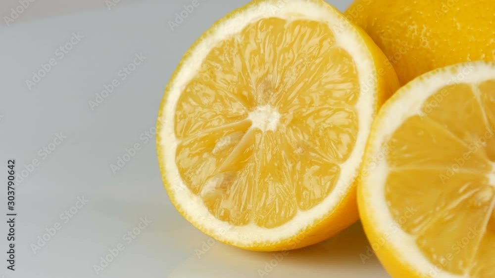 Ripe fresh juicy yellow lemon on a white background rotate Ripe fresh juicy yellow lemon on a white background rotate