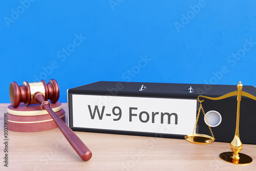 W-9 Form – Folder with labeling, gavel and libra – law, judgement, lawyer photo