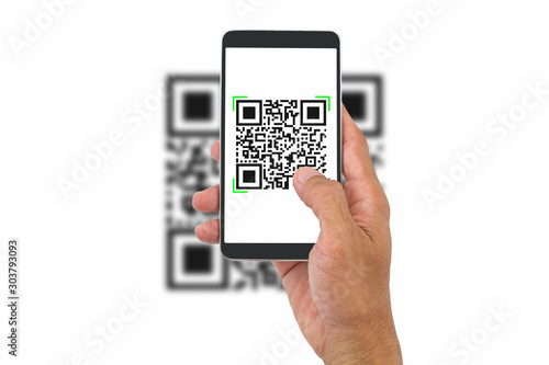 Hand holding smartphone scanning QR code on white background, business concept