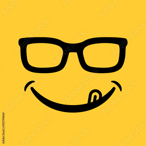 smile emoticon with tongue and sunglasses on yellow background
