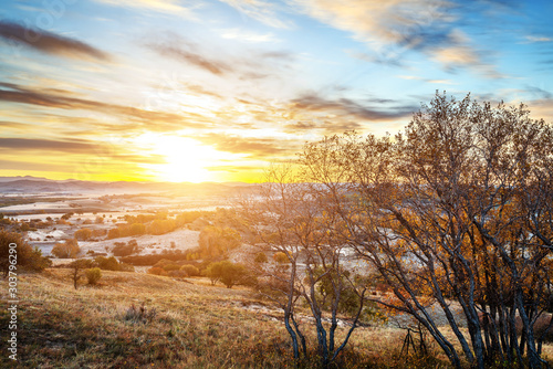 Early morning grassland and mountains