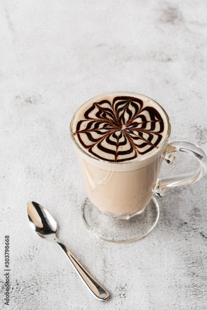 winter eggnog in glass mug with milk, rum and cinnamon and chocolate covered with whipped cream on bright marble background. copy space. Advertising for cafe menu. Coffee shop menu. Vertical photo.