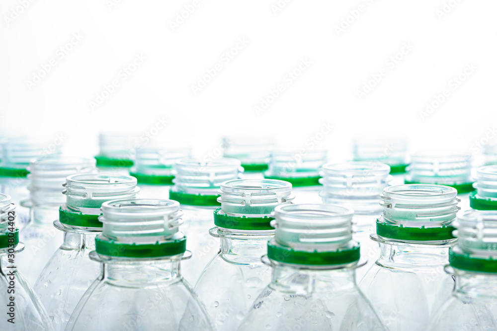 necks of plastic bottles without caps on white background necks of plastic bottles without caps on white background