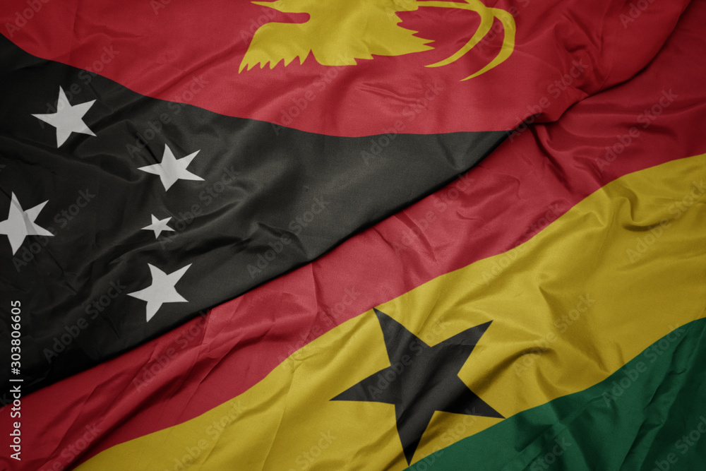 waving colorful flag of ghana and national flag of Papua New Guinea . waving colorful flag of ghana and national flag of Papua New Guinea .