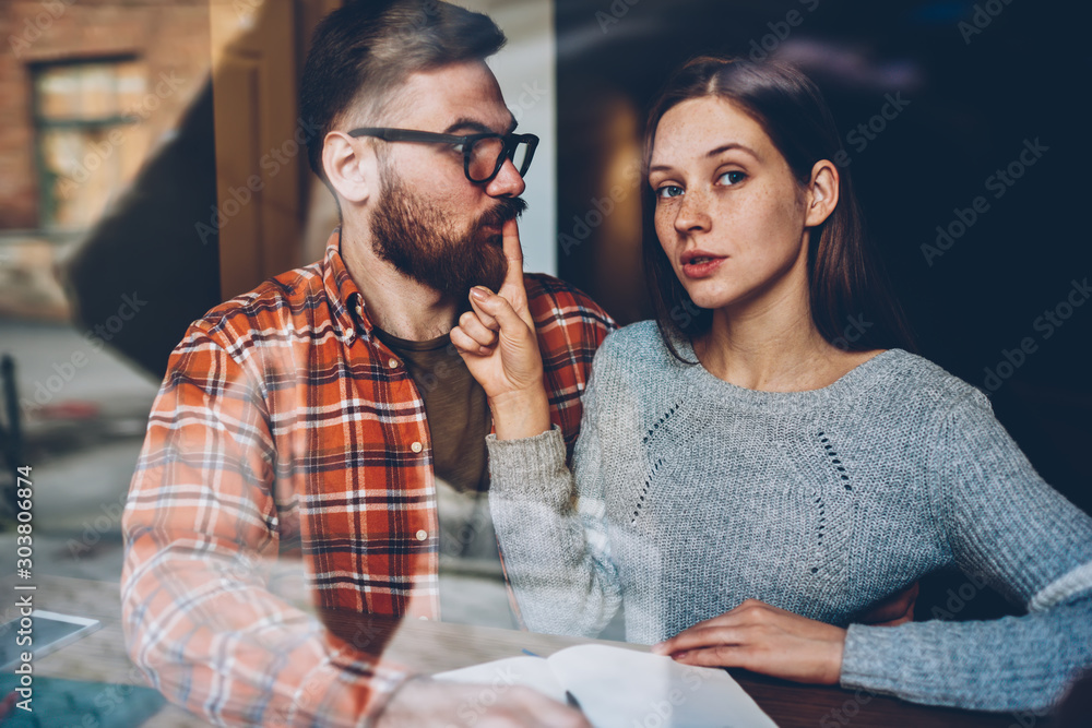 Φωτογραφία Half length portrait of attractive young woman making boyfriend stop talking during conflict in relationship