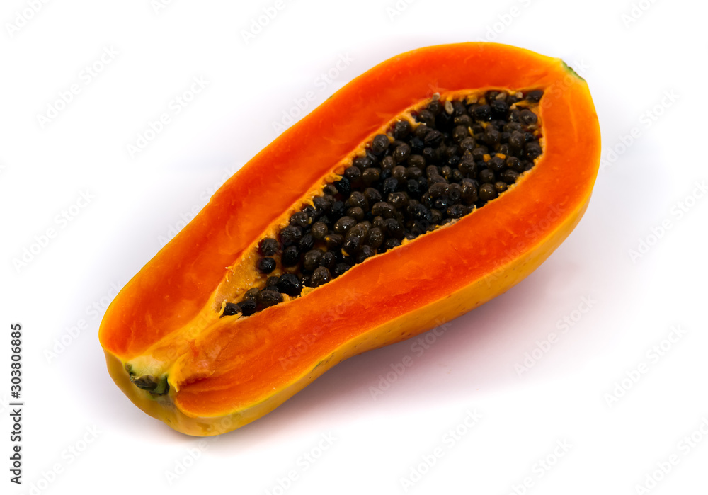 Papaya fruit sliced on half isolated on a white background. Papaya fruit sliced on half isolated on a white background.