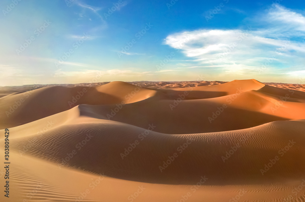 Sand dunes and cloudy sky in Oman