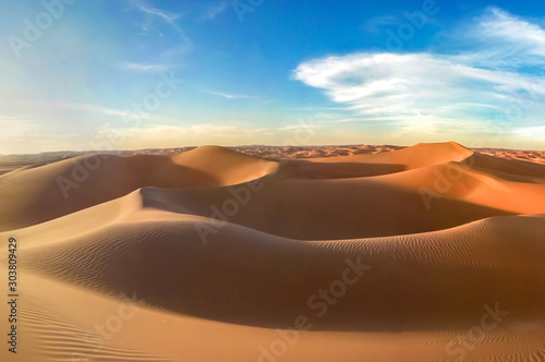 Sand dunes and cloudy sky in Oman