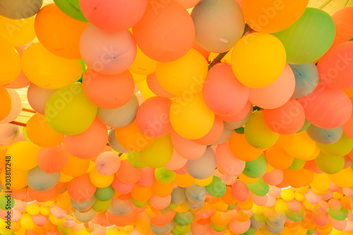 Many balloons arranged in a lot.
