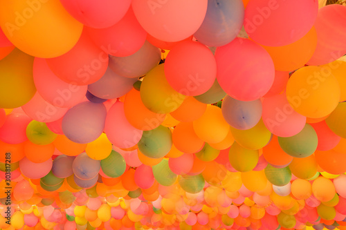 Many balloons arranged in a lot.