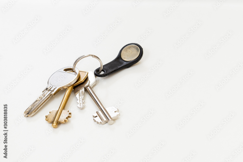 a bunch of keys on white background space for text a bunch of keys on white background space for text