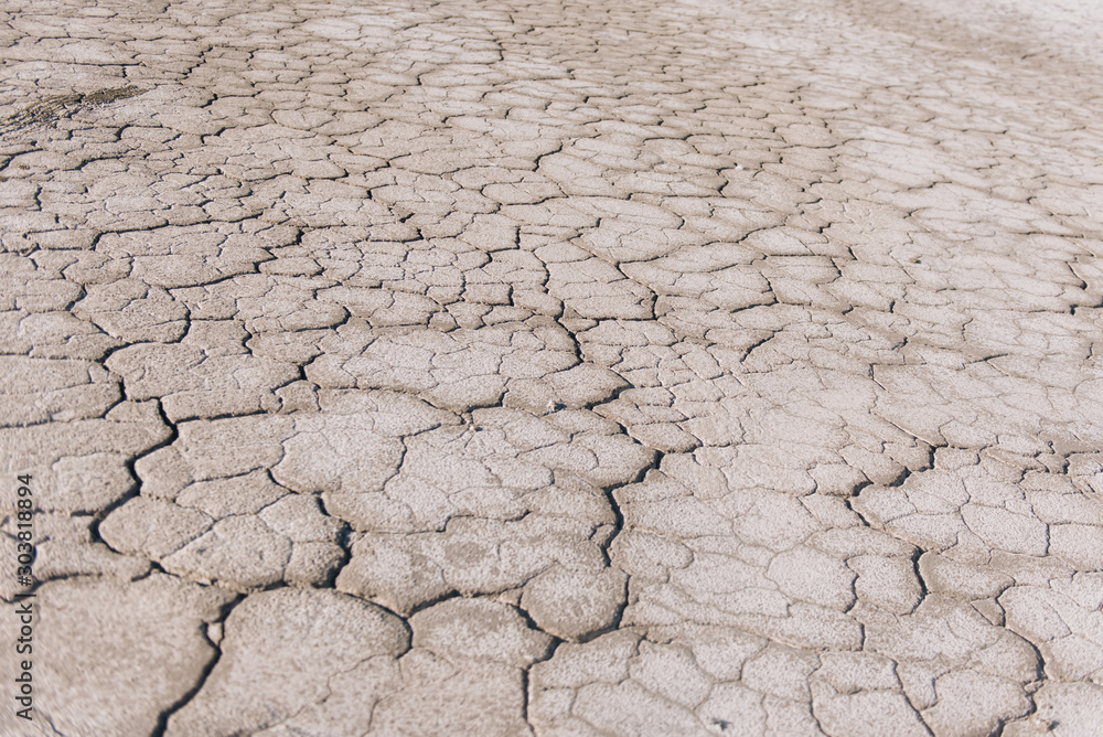 Brown dry soil or desert cracked ground texture background,land arid earth warming. Brown dry soil or desert cracked ground texture background,land arid earth warming.