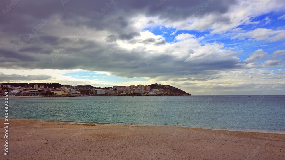 Coastline with cloudy sky in the sunny day
