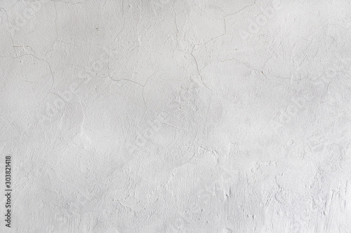 Canvas-taulu Rough white relief stucco with cracks wall texture background