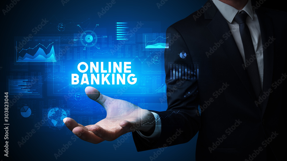 Hand of Businessman holding ONLINE BANKING inscription, business success concept Hand of Businessman holding ONLINE BANKING inscription, business success concept