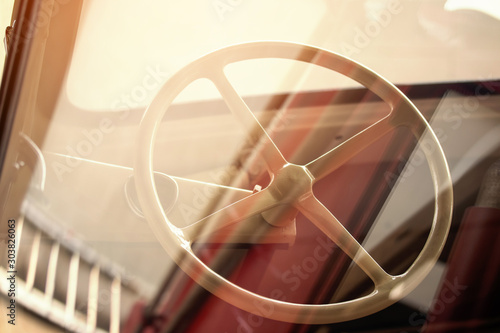 Interior of classic vintage car, Steering wheel on American classic car.