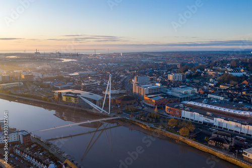 An aerial view at sunrise of Newport city centre, south wales United Kingdom, taken from the River Usk © Stephen Davies