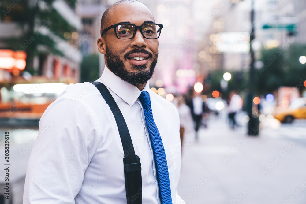 Positive ethnic employee looking at camera Positive ethnic employee looking at camera