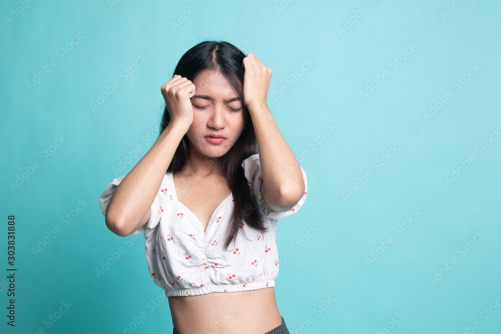 Young Asian woman got sick and headache Young Asian woman got sick and headache