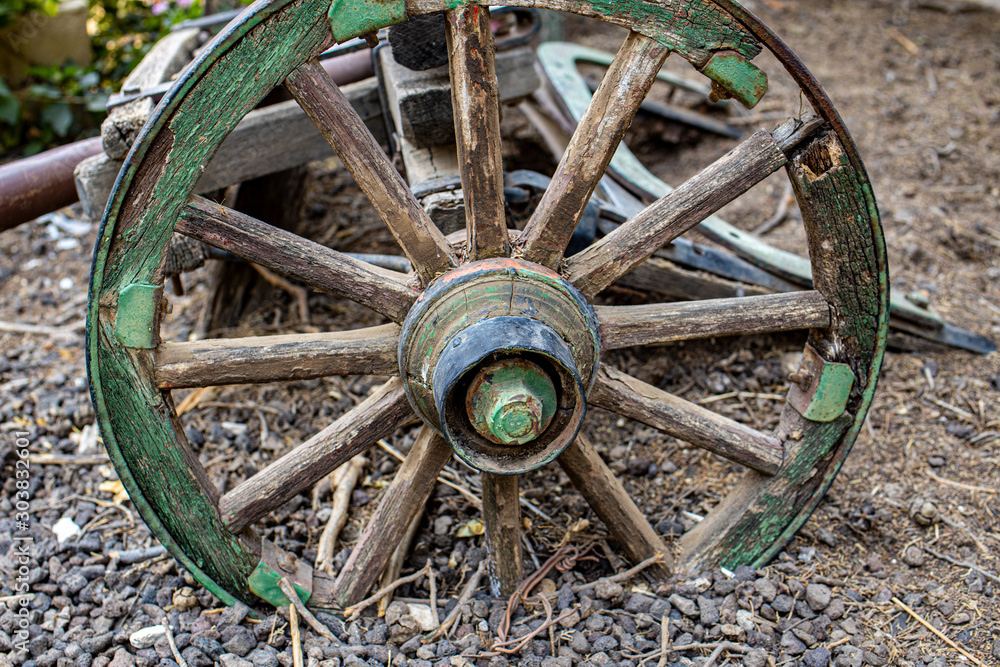 Fragment of wheels Old iron black agricultural plow