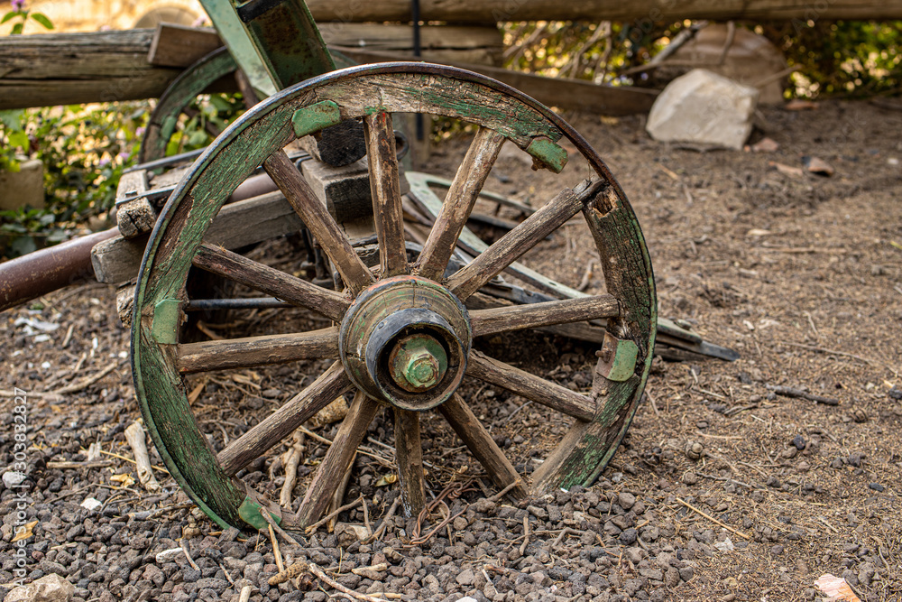 Fragment of wheels Old iron black agricultural plow Fragment of wheels Old iron black agricultural plow