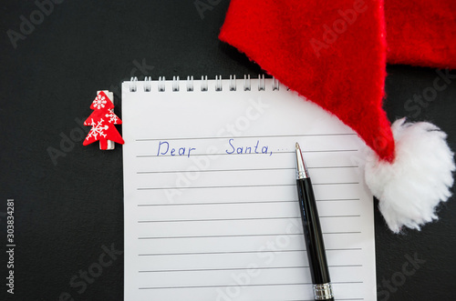 handwritten child letter to santa claus for 2020 new year with copy space.