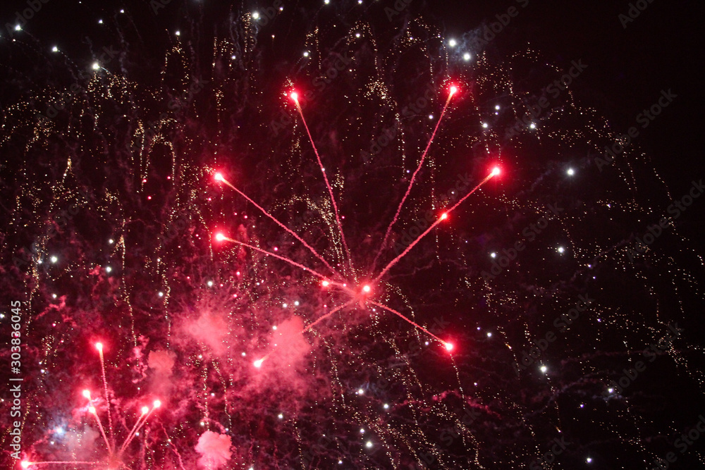 Beautiful view of fireworks in the black sky. Beautiful view of fireworks in the black sky.