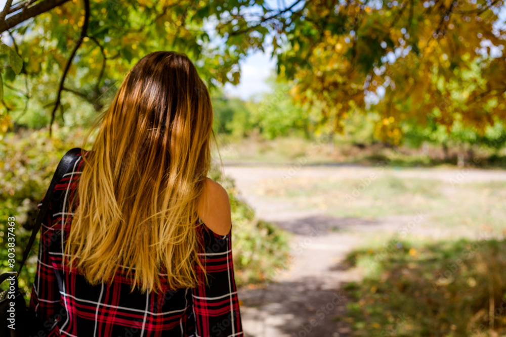 autumn season. portrait of a woman playing with leaves autumn season. portrait of a woman playing with leaves