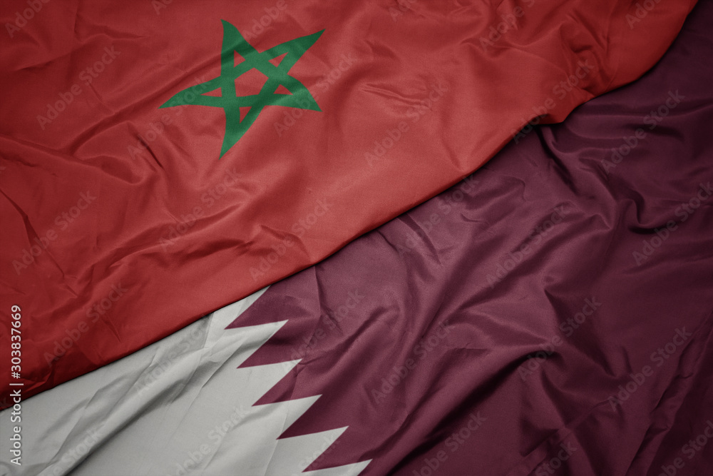 waving colorful flag of qatar and national flag of morocco. waving colorful flag of qatar and national flag of morocco.