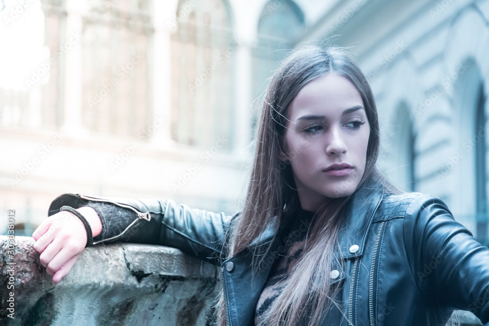 Portrait of serious looking woman outdoors