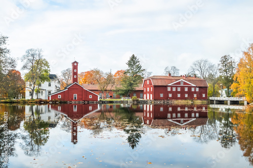 The red wooden buildings at the former plant Stromfors, Ruotsinpyhtaa, Finland photo