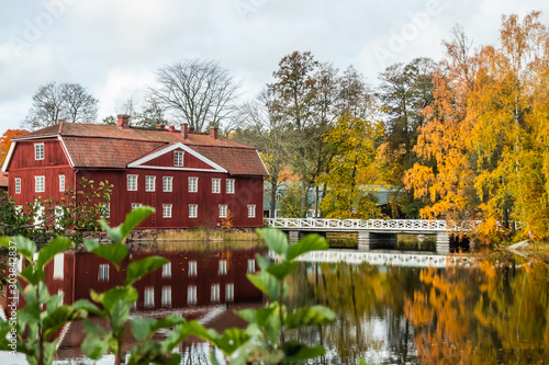 The red wooden building at the former plant Stromfors, Ruotsinpyhtaa, Finland photo