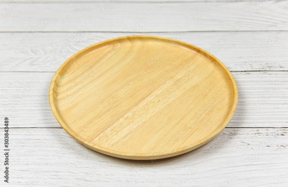 Natural kitchen tools wood products / Kitchen utensils background with wooden plate