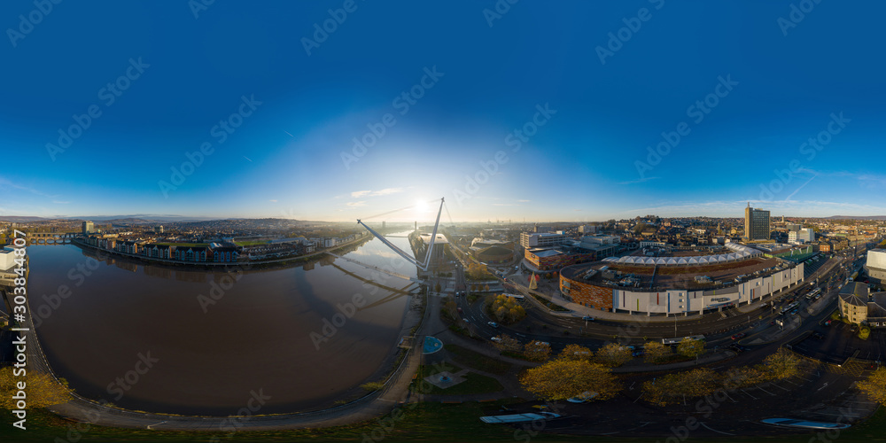 360 aerial view at sunrise of Newport city centre, south wales United Kingdom, taken from the River Usk