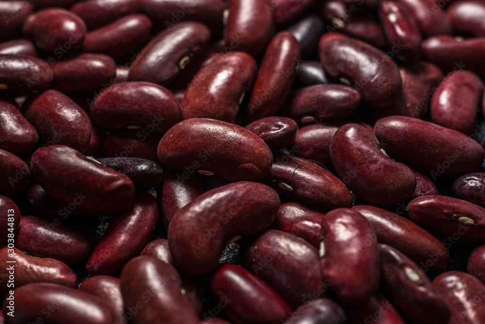 red healthy beans on a dark gray background red healthy beans on a dark gray background