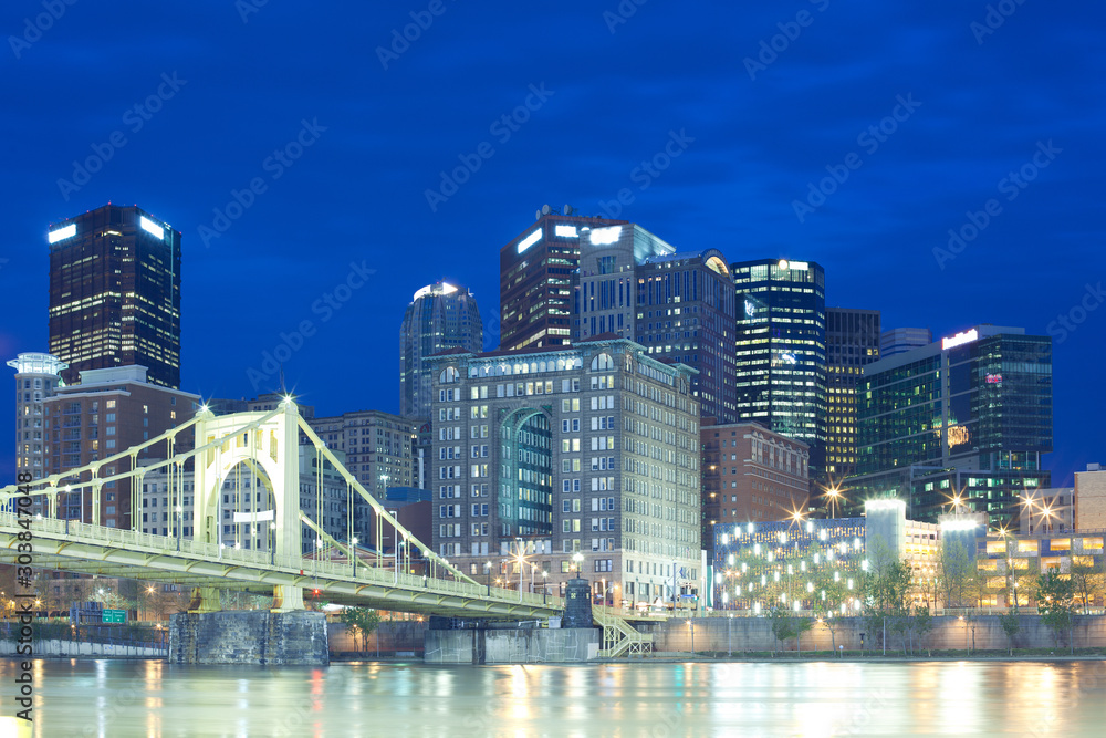 Downtown skyline and Roberto Clemente Bridge over Allegheny River, Pittsburgh, Pennsylvania, USA