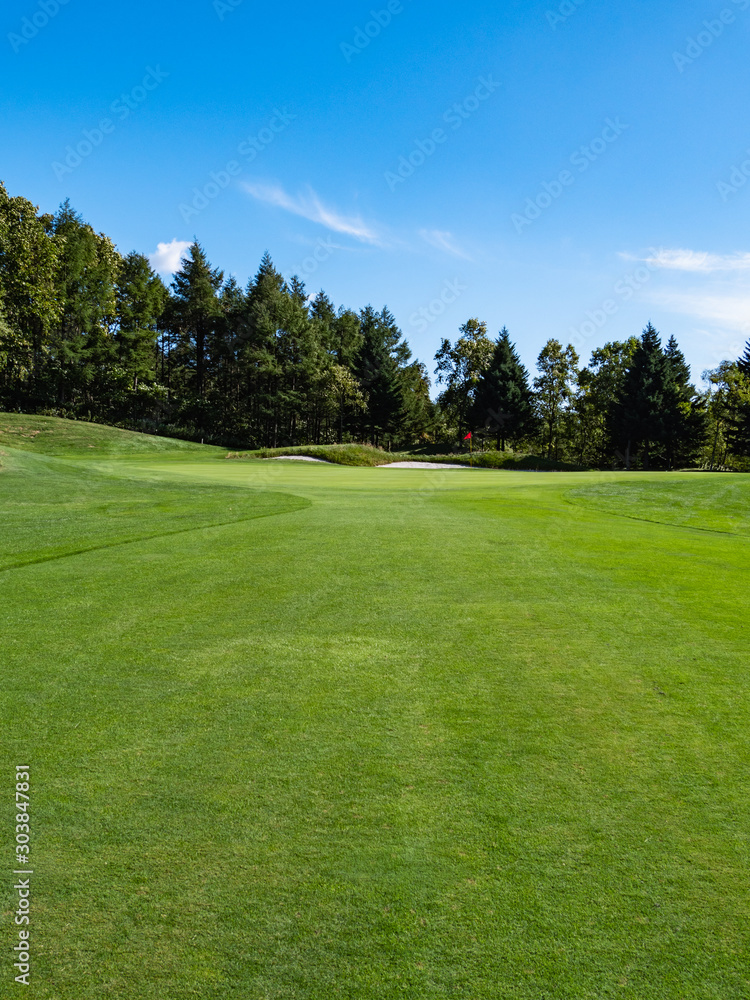 Golf Course with beautiful green field. Golf course with a rich green turf beautiful scenery.