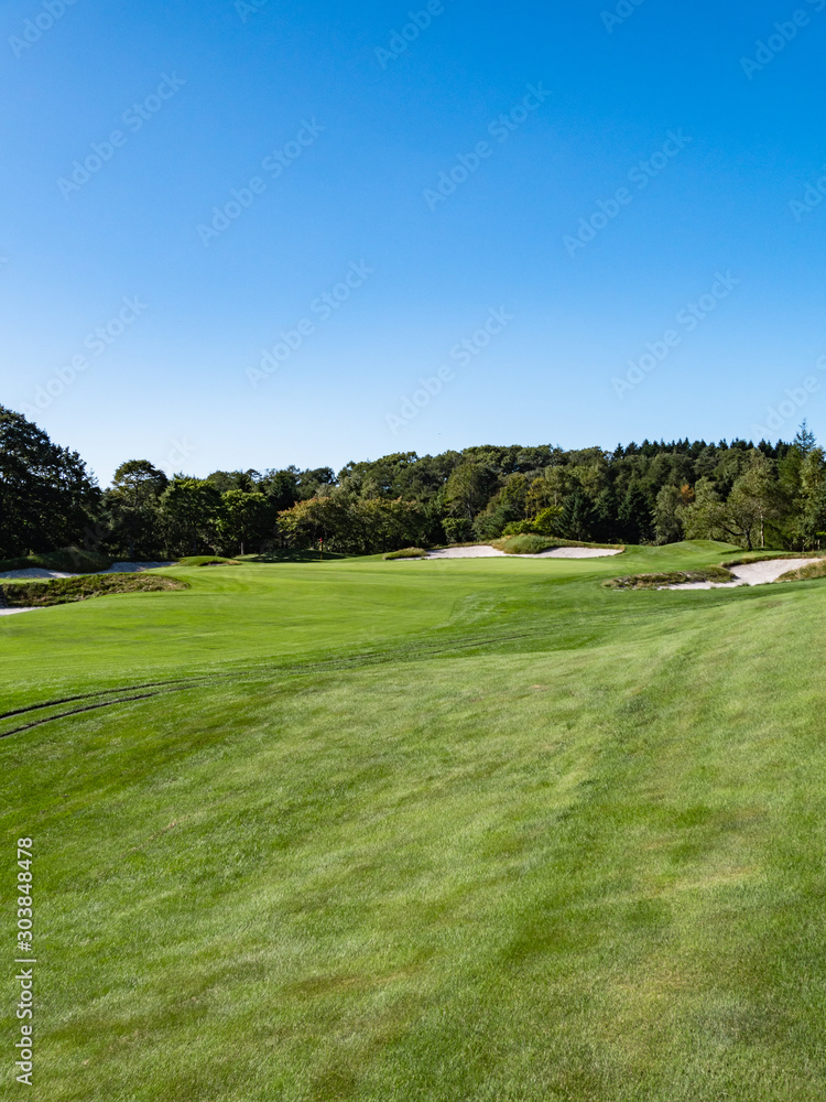Golf Course with beautiful green field. Golf course with a rich green turf beautiful scenery. Golf Course with beautiful green field. Golf course with a rich green turf beautiful scenery.
