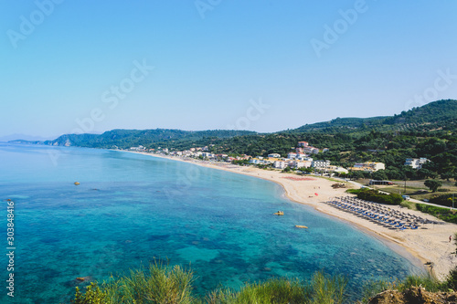 Fototapeta Naklejka Na Ścianę i Meble -  Panoramic view Vrachos beach in Greece at noon