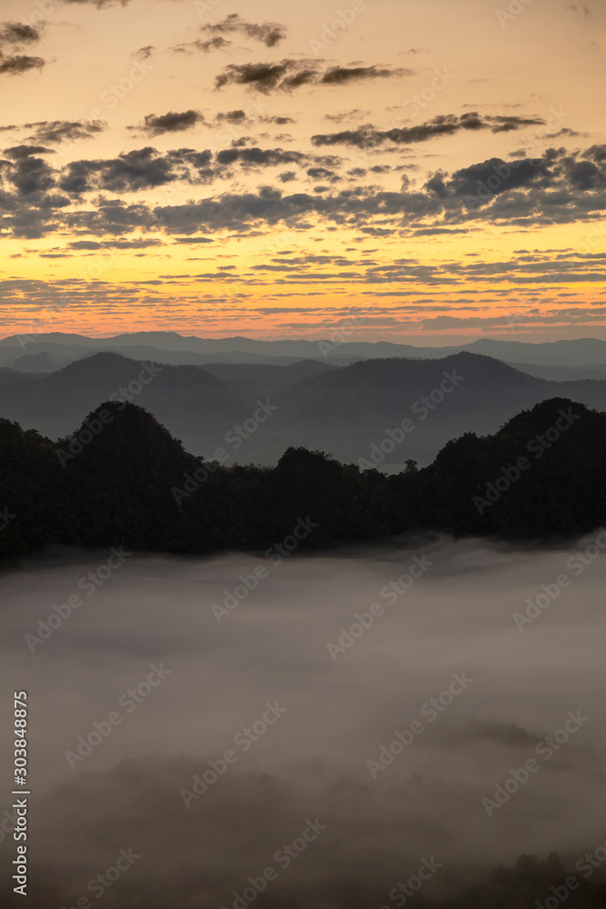 mountains under mist in the morning